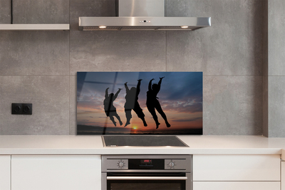 Painel de vidro Pessoas pôr do sol nuvens