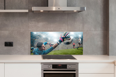 Painel de vidro Homem defendendo a bola