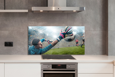 Painel de vidro Homem defendendo a bola