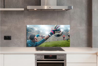 Painel de vidro Homem defendendo a bola