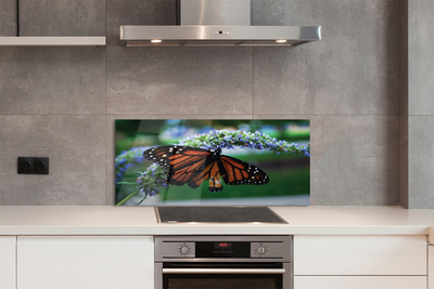 Painel de vidro Borboleta em uma flor