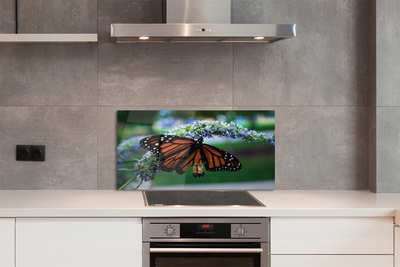 Painel de vidro Borboleta em uma flor
