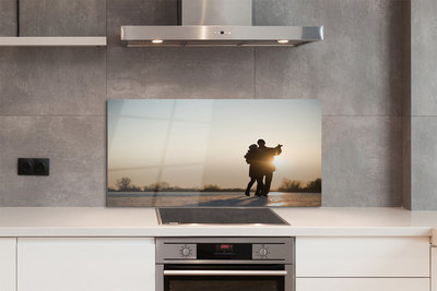 Painel de vidro As pessoas dançam no inverno