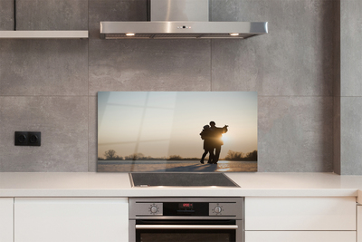 Painel de vidro As pessoas dançam no inverno