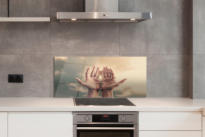 Painel de vidro Mãos cruzam o céu