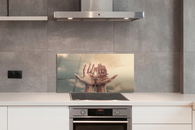 Painel de vidro Mãos cruzam o céu