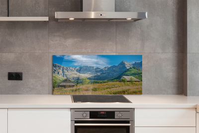 Painel de vidro Montanhas, campos, casas