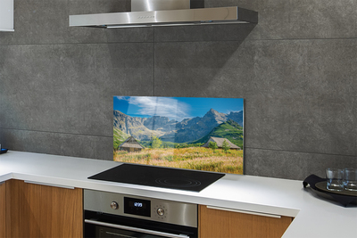 Painel de vidro Montanhas, campos, casas