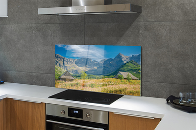 Painel de vidro Montanhas, campos, casas