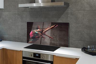 Painel de vidro Mulher fazendo espacate