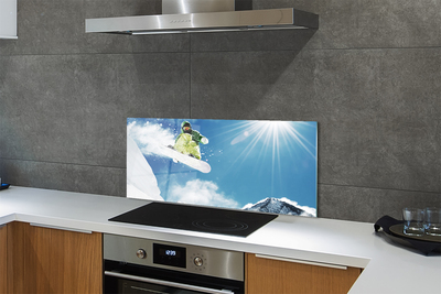 Painel de vidro Homem de snowboard nas montanhas