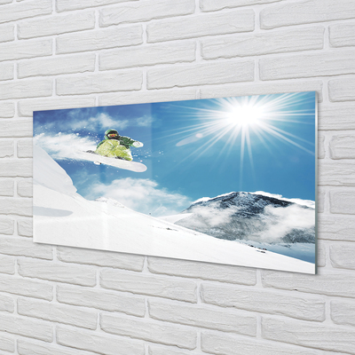 Painel de vidro Homem de snowboard nas montanhas