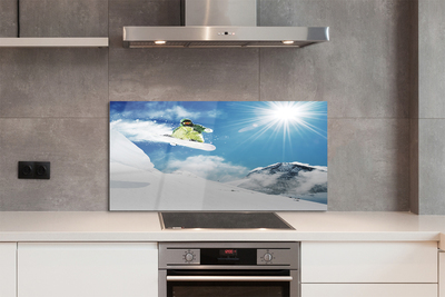 Painel de vidro Homem de snowboard nas montanhas