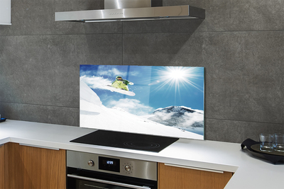 Painel de vidro Homem de snowboard nas montanhas