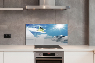 Painel de vidro Homem de snowboard nas montanhas