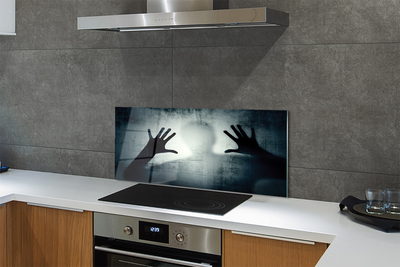 Painel de vidro Sombra da mão e da cabeça da figura