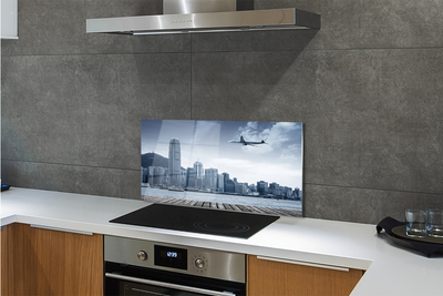 Painel de vidro Nuvens de cidade de avião