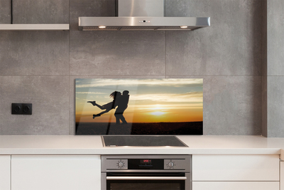 Painel de vidro Pessoas pôr do sol nuvens