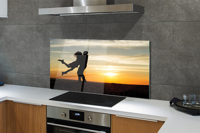 Painel de vidro Pessoas pôr do sol nuvens