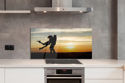 Painel de vidro Pessoas pôr do sol nuvens