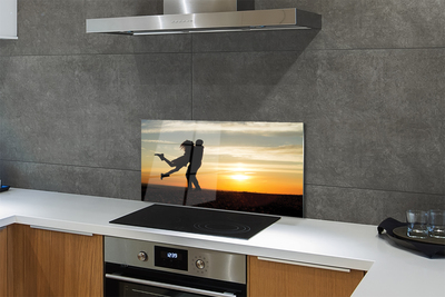 Painel de vidro Pessoas pôr do sol nuvens