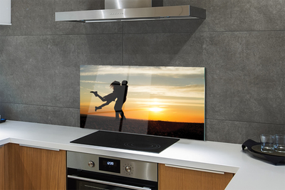 Painel de vidro Pessoas pôr do sol nuvens