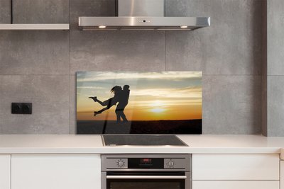 Painel de vidro Pessoas pôr do sol nuvens