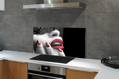 Painel de vidro Lábios e unhas de mulher