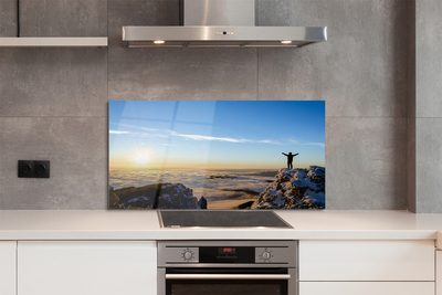 Painel de vidro Montanhas homem nuvens nascer do sol