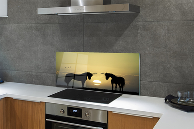 Painel de vidro Unicórnios do pôr do sol no campo