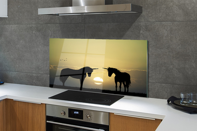 Painel de vidro Unicórnios do pôr do sol no campo