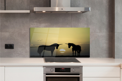 Painel de vidro Unicórnios do pôr do sol no campo