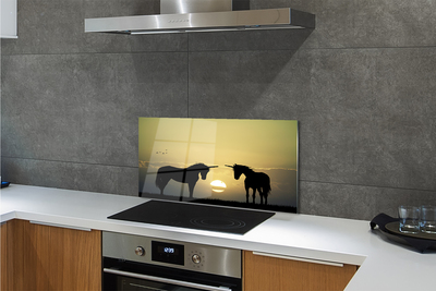 Painel de vidro Unicórnios do pôr do sol no campo