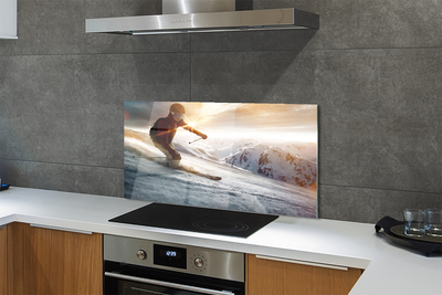 Painel de vidro Homem com bastões de esqui