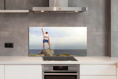 Painel de vidro Homem mar céu