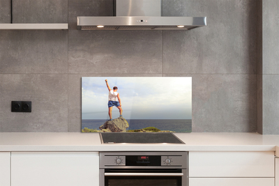 Painel de vidro Homem mar céu