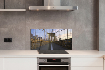 Painel de vidro Pôr do sol na ponte dos arranha-céus