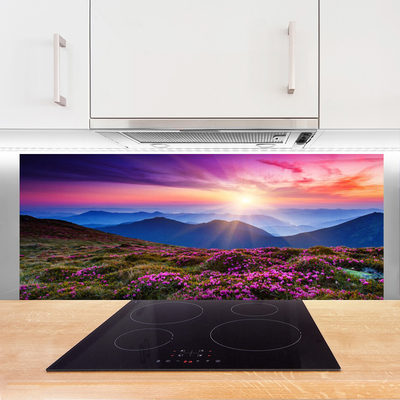 Painel vidro cozinha Paisagem de sol em prado de montanha