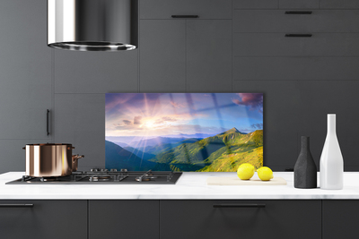 Painel vidro cozinha Paisagem de sol em prado de montanha