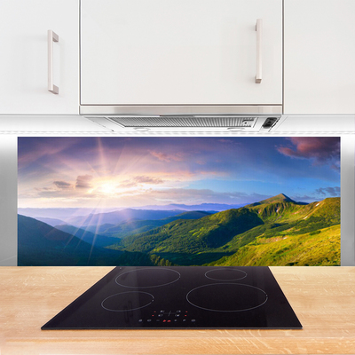 Painel vidro cozinha Paisagem de sol em prado de montanha
