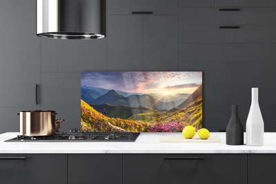 Painel vidro cozinha Paisagem de sol em prado de montanha