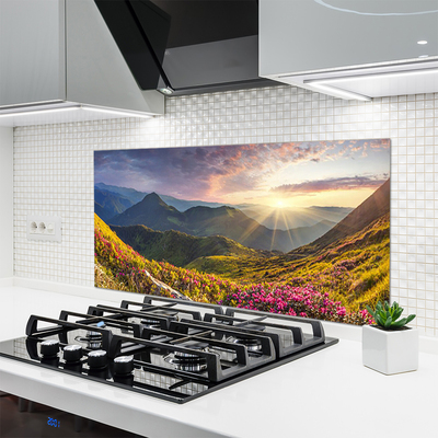 Painel vidro cozinha Paisagem de sol em prado de montanha