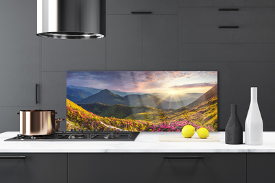 Painel vidro cozinha Paisagem de sol em prado de montanha