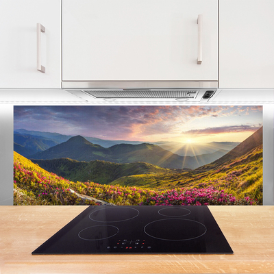 Painel vidro cozinha Paisagem de sol em prado de montanha