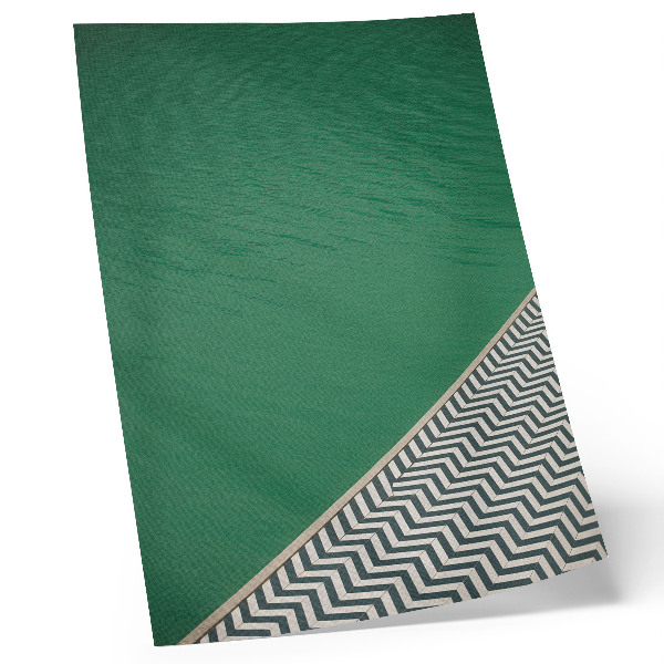 Arte de parede Verde com um padrão geométrico em preto e branco