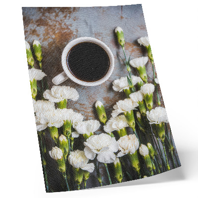 Arte de parede Uma xícara de café e flores de cravo branco.