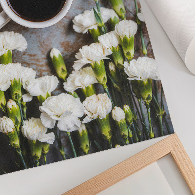 Arte de parede Uma xícara de café e flores de cravo branco.