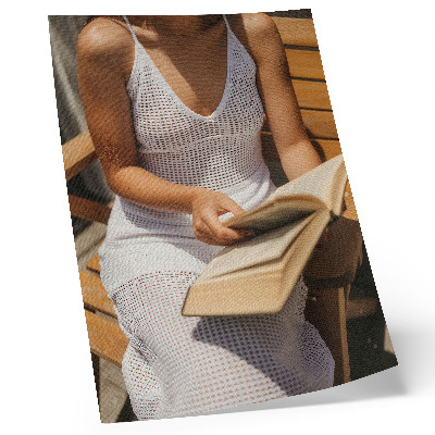 Poster para cozinha Mulher com um livro, banco de madeira, sol