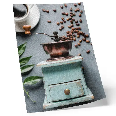 Poster decorativo moedor de café antigo na cor turquesa com grãos e folhas verdes