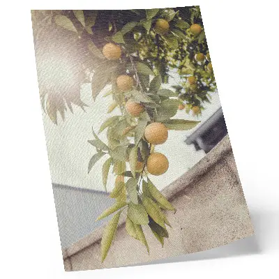 Poster decorativo com galho de árvore e folhas verdes e laranja